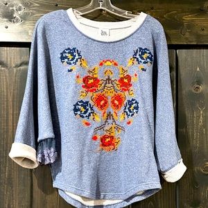 Comfy Floral Denim Colored Ivy Jane Top with a Ruffle